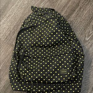 Chic Black Backpack with Yellow Heart Design